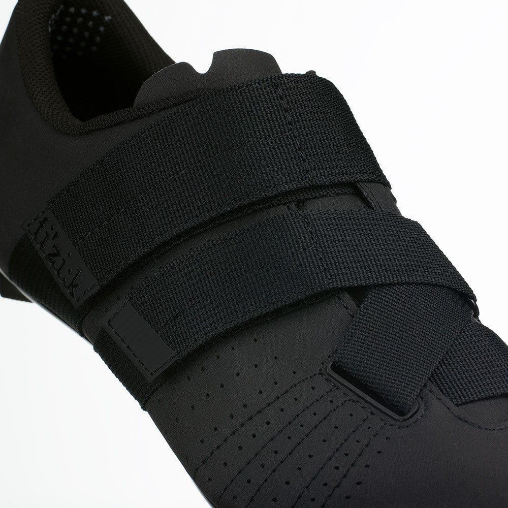 Close-up of black Fizik Tempo R5 PowerStrap cycling shoe showing velcro straps