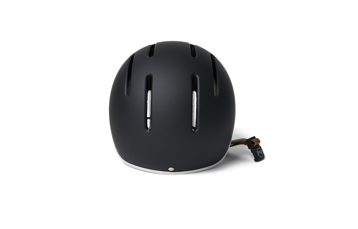 Thousand JR Kids Helmet in matte carbon black with ventilation slots and chin strap
