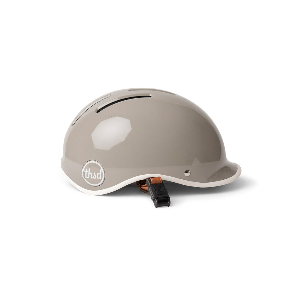 Thousand Heritage 2.0 bicycle helmet in dove grey with white trim and orange strap