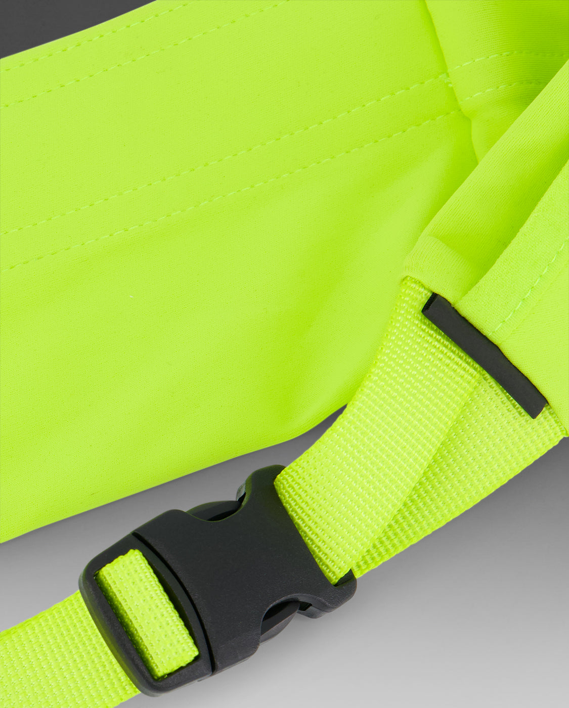 2XU Run Belt in bright volt yellow with black plastic buckle and adjustable strap