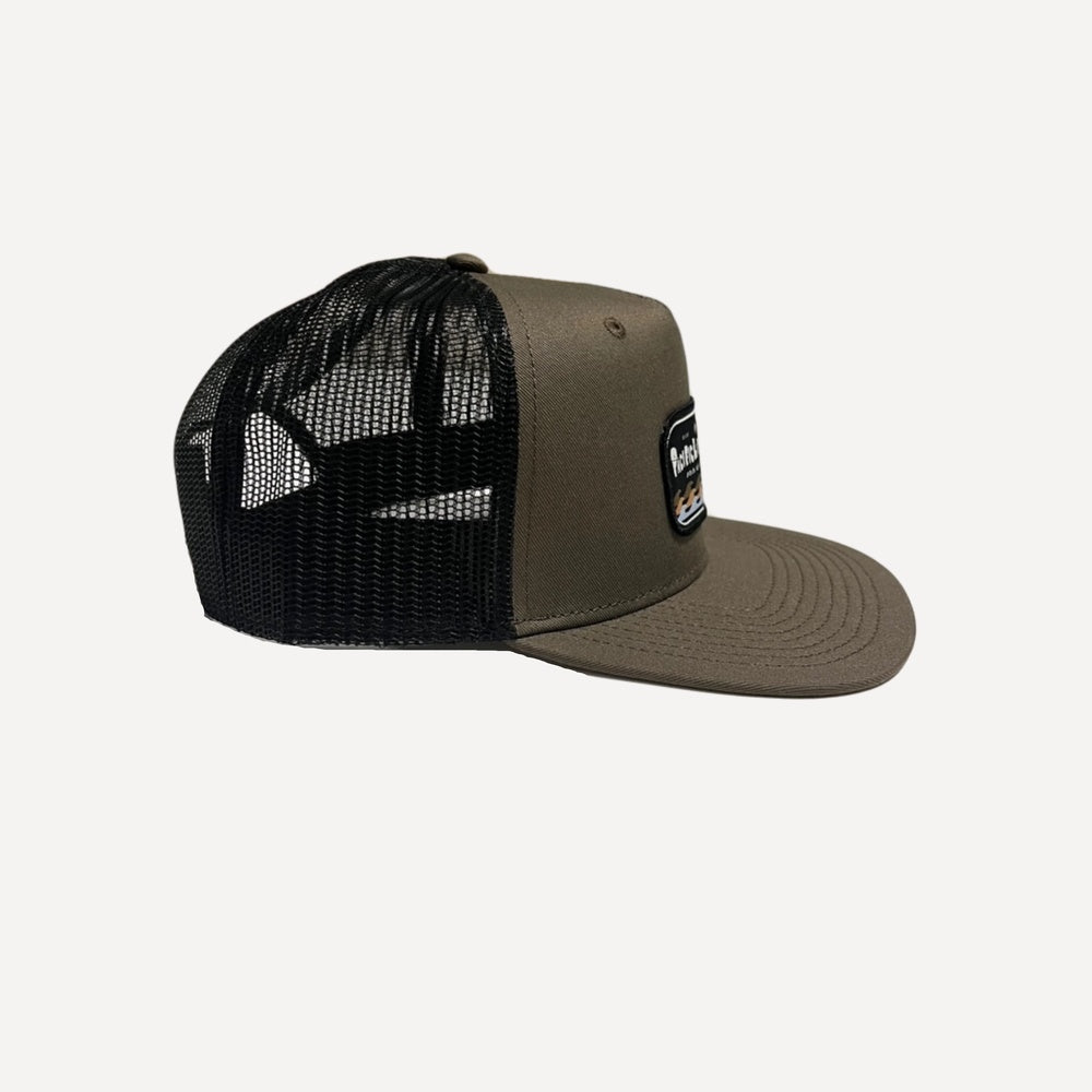 Legg Dawn Patrol trucker hat in olive green with black mesh back and flat brim