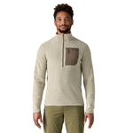 Man wearing Patagonia R1 Air Fleece Zip-Neck in Pelican color with chest pocket