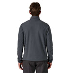 Back view of man wearing Patagonia R1 Air Zip-Neck in dark gray