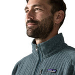 Close-up of man wearing Patagonia Better Sweater Fleece Jacket in Blue Sage rib knit, collar detail