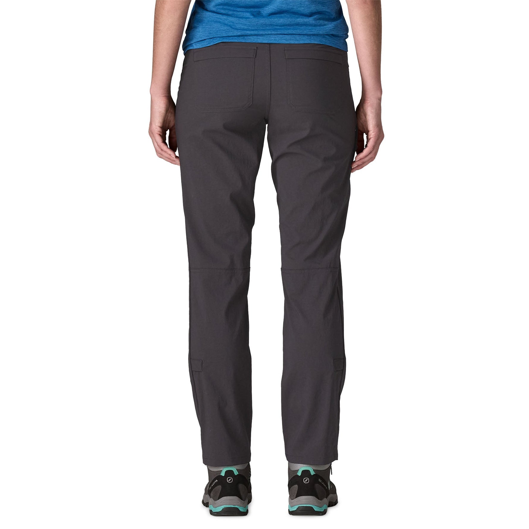 Patagonia Women's Quandary Pants in dark gray shown from back view on model