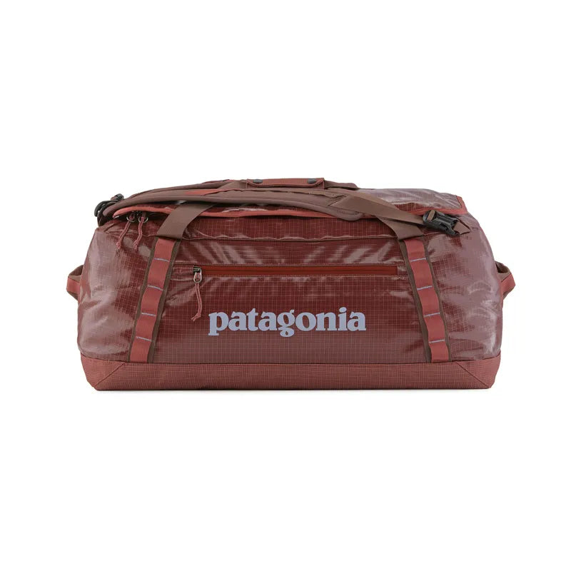 Patagonia Black Hole Duffel Bag in Rosehip color with clean studio background