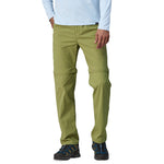 Man wearing olive green Patagonia Quandary convertible pants with zip-off legs