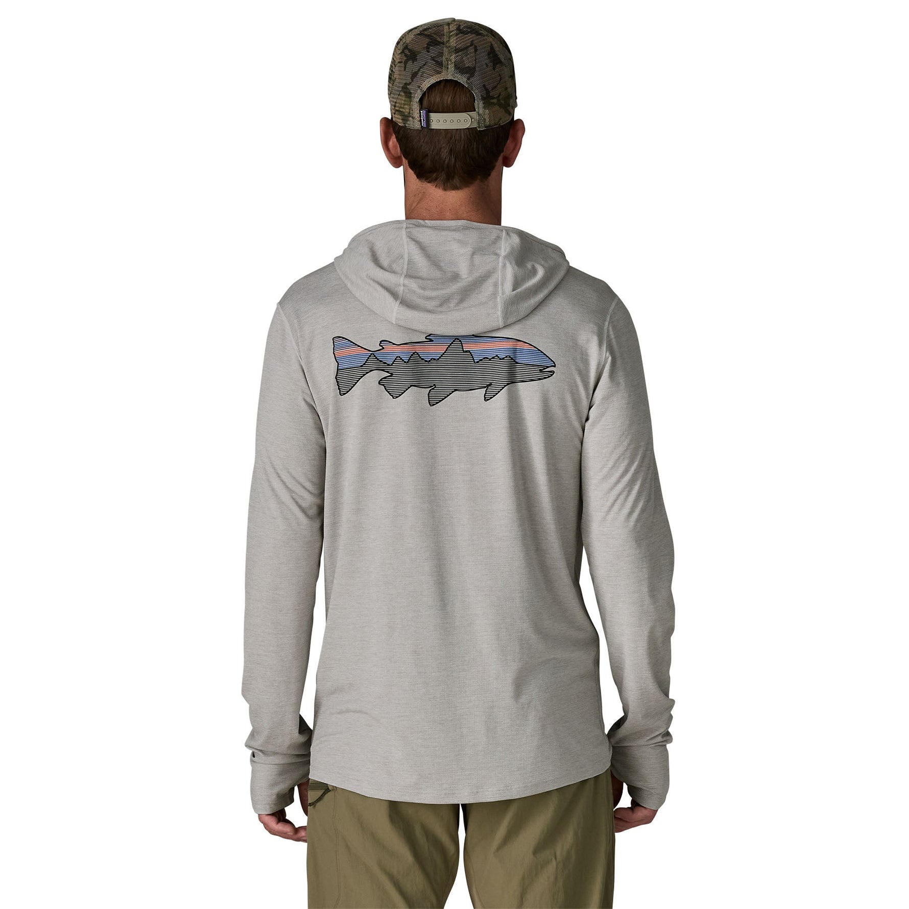 Man wearing Patagonia light grey hooded long sleeve shirt with colorful fish graphic on back