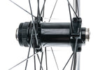 Close-up of Fulcrum disc brake front hub showing axle and spoke attachment detail