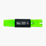 Muc-Off bright green tire levers with black neoprene sleeve on white background