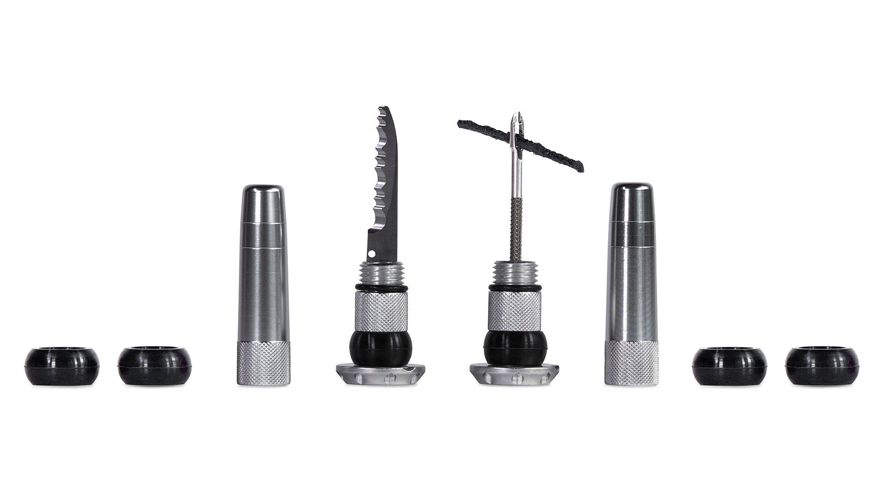 Muc-Off Stealth Tubeless Puncture Plugs kit with black tools and rubber plugs