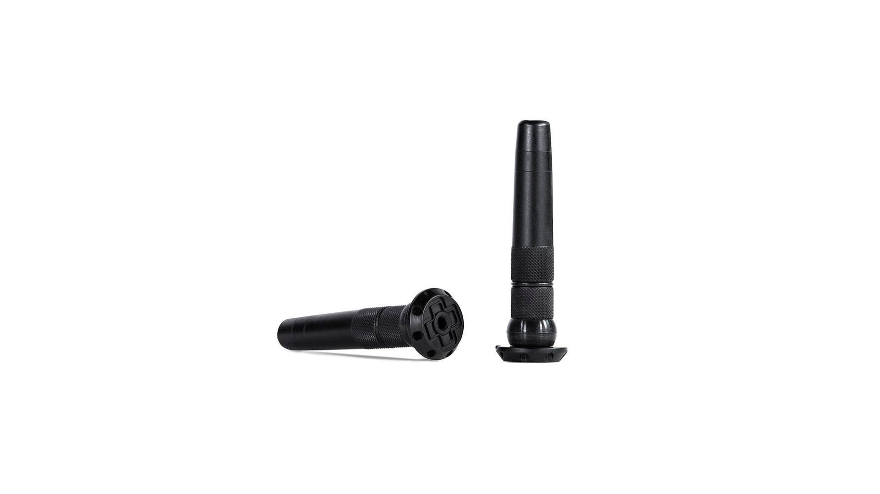 Muc-Off Stealth black tubeless puncture plugs shown disassembled on white background