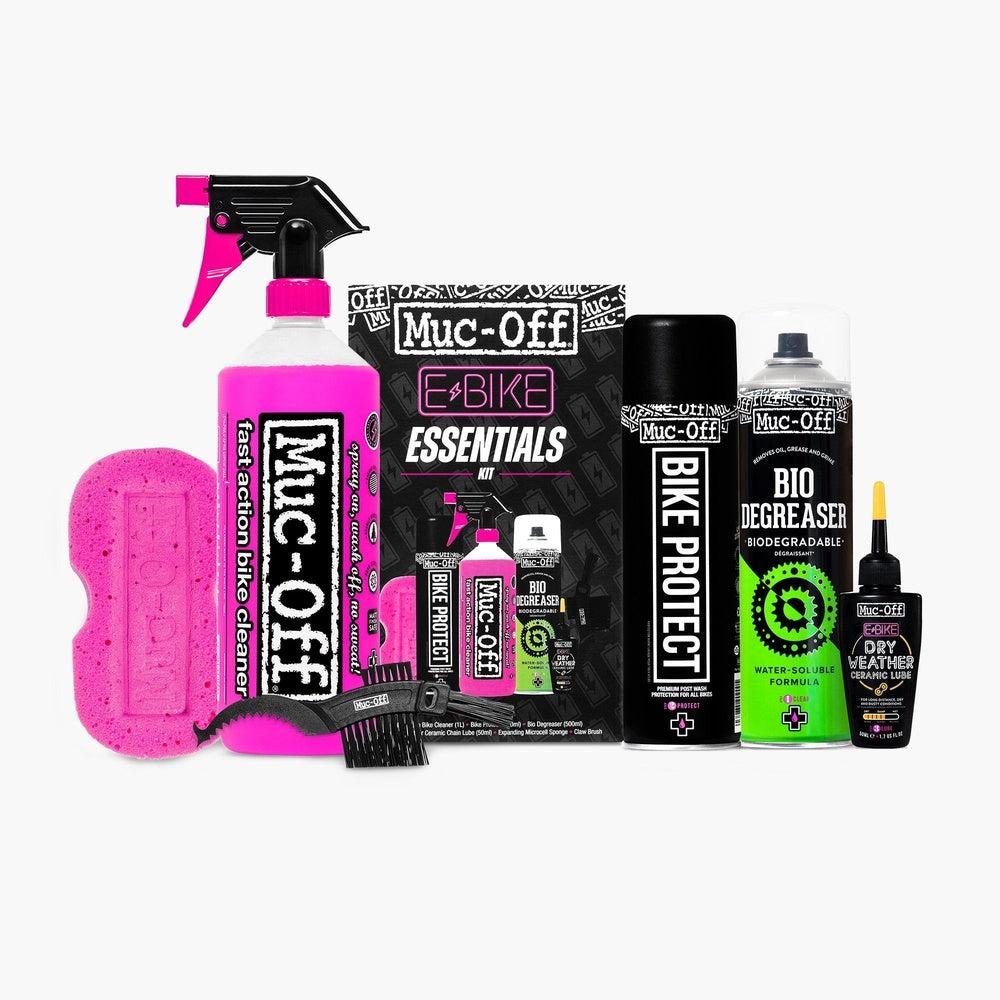 Muc-Off Ebike Essentials Kit with pink bike cleaner, black packaging and cleaning accessories