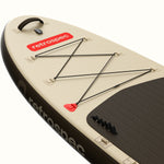 Retrospec inflatable stand up paddle board in tan with bungee cargo system and dark traction pad