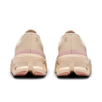 On Cloudmonster 2 women's running shoes in Moon/Fawn colorway, rear view