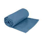Sea To Summit Drylite Towel in Moonlight Blue, rolled and partially unfolded