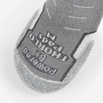 Experia Light Cushion Low-Cut Sock in grey with dark panel and white accents, sole view