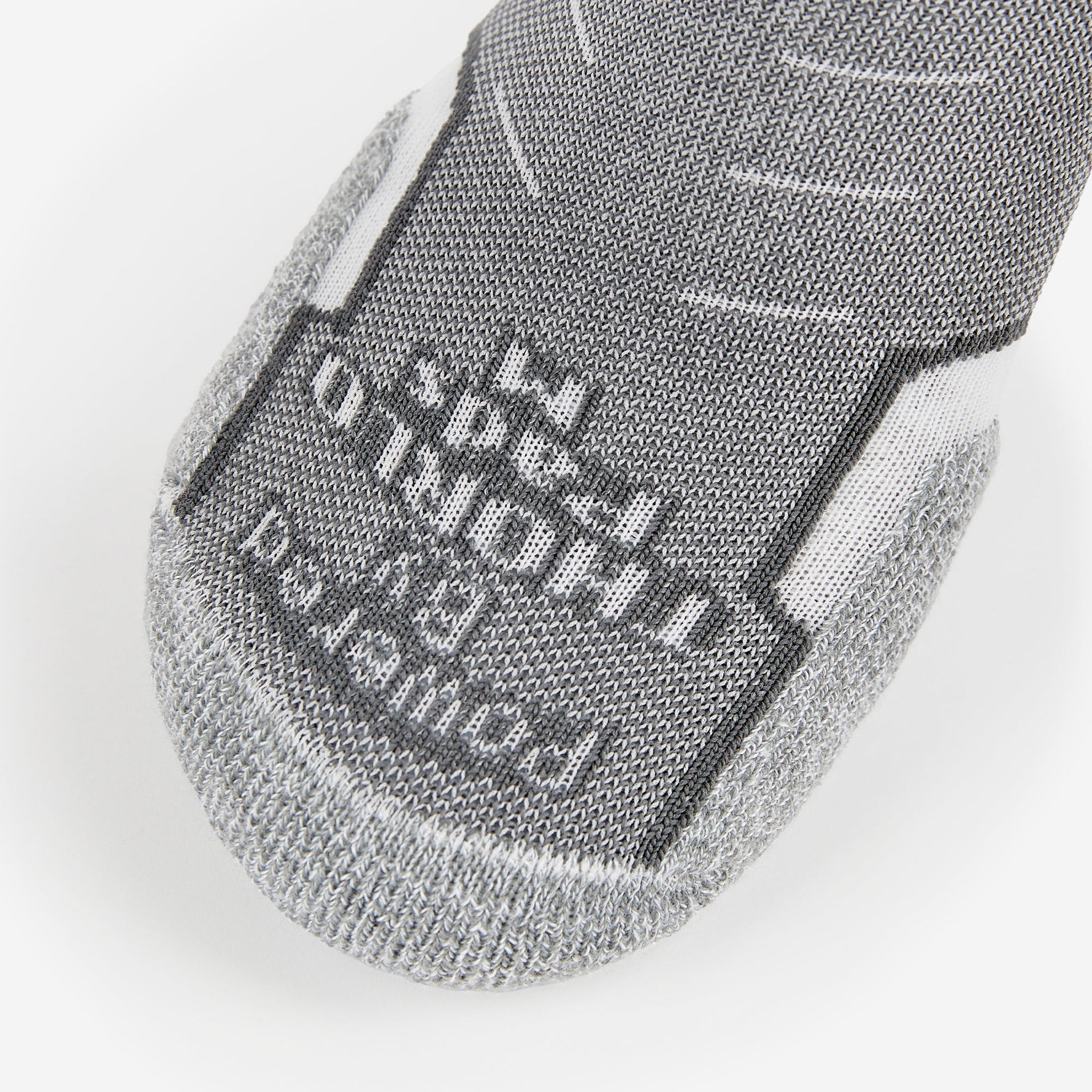 Experia Light Cushion Low-Cut Sock in grey with dark panel and white accents, sole view