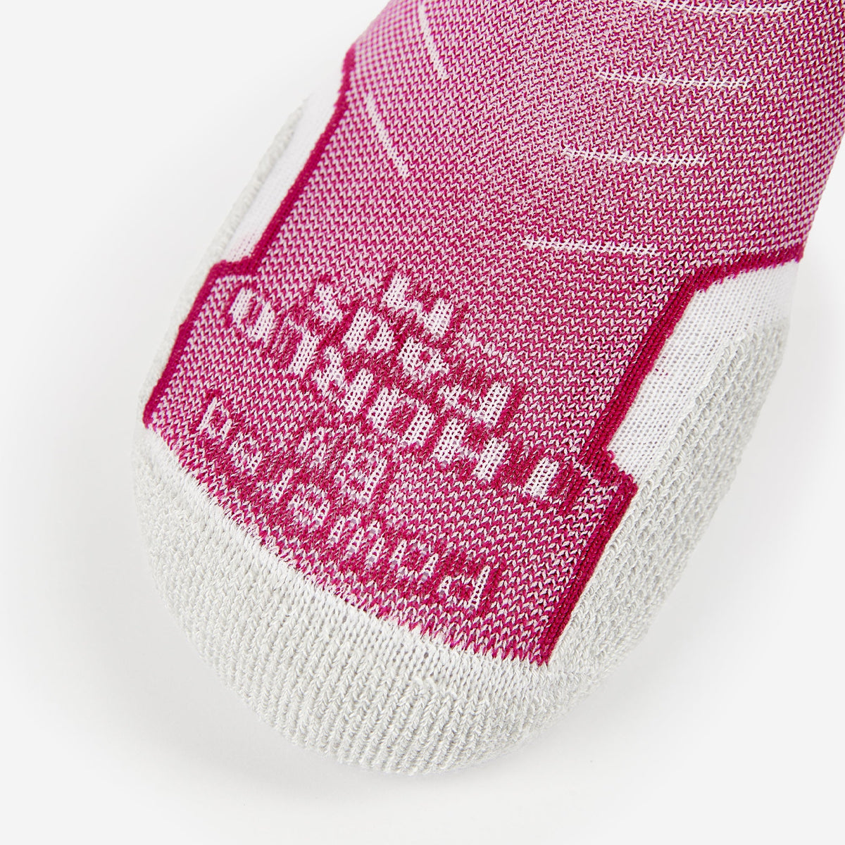 Thorlos Experia Energy sock in pink and white showing toe box detail with knit branding