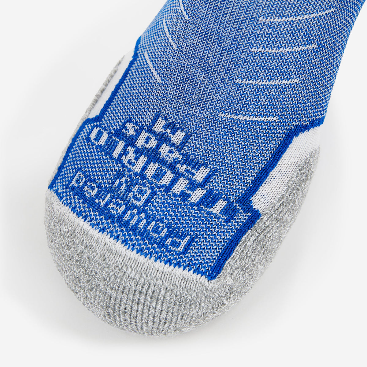Thorlos Experia Energy sock in blue and gray showing toe box detail with brand text