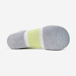 Bottom view of Thorlos Experia Energy sock in gray with neon yellow stripe
