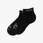 Pair of black Experia TECHFIT Light Cushion ankle socks on white background