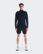 Male model wearing navy On 5-inch Performance 2-in-1 shorts with matching quarter-zip top