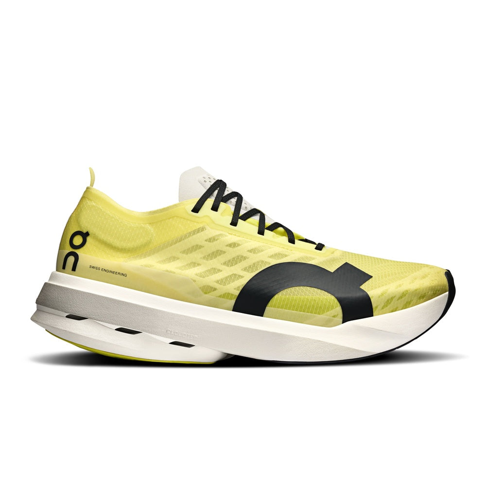 On Cloudboom Strike running shoe in bright yellow limelight colorway with black details
