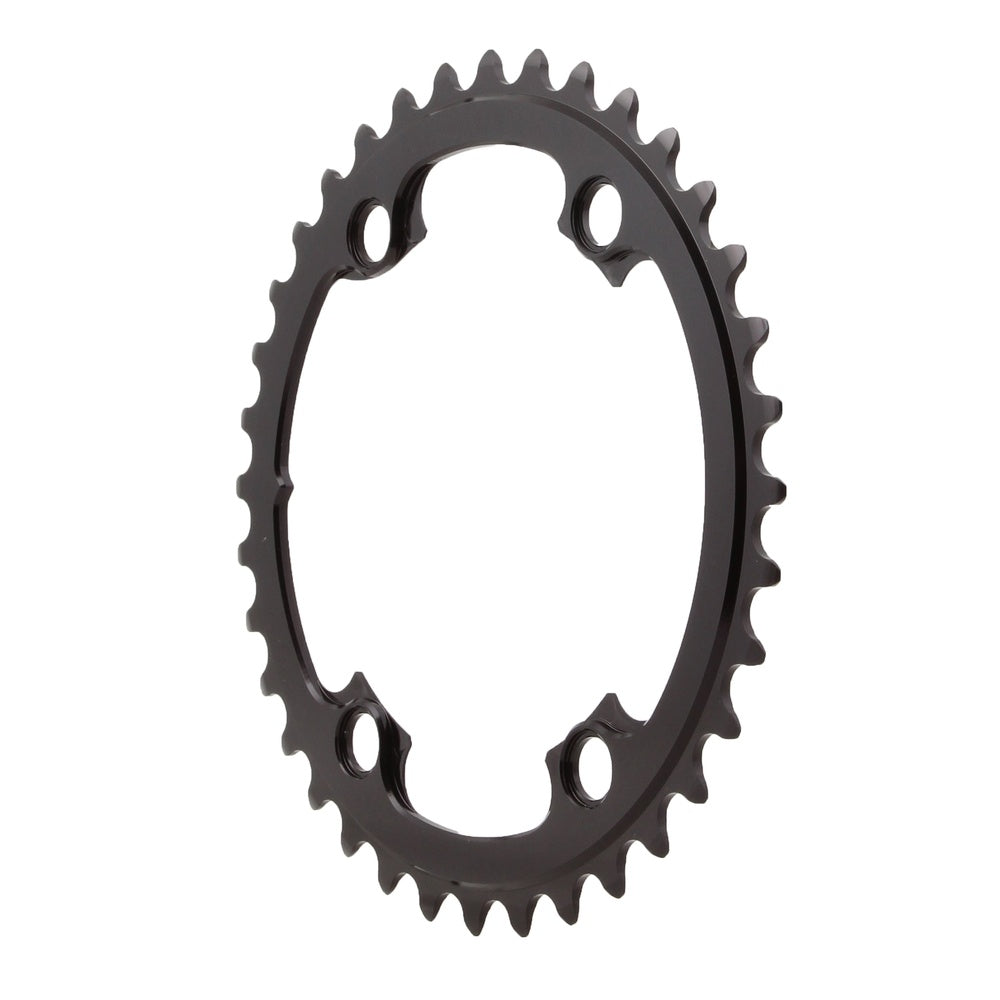 Black absoluteBLACK round chainring with teeth and four bolt holes on white background