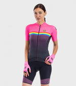 Woman wearing ALE PRR cycling jersey in pink fluo with rainbow stripe