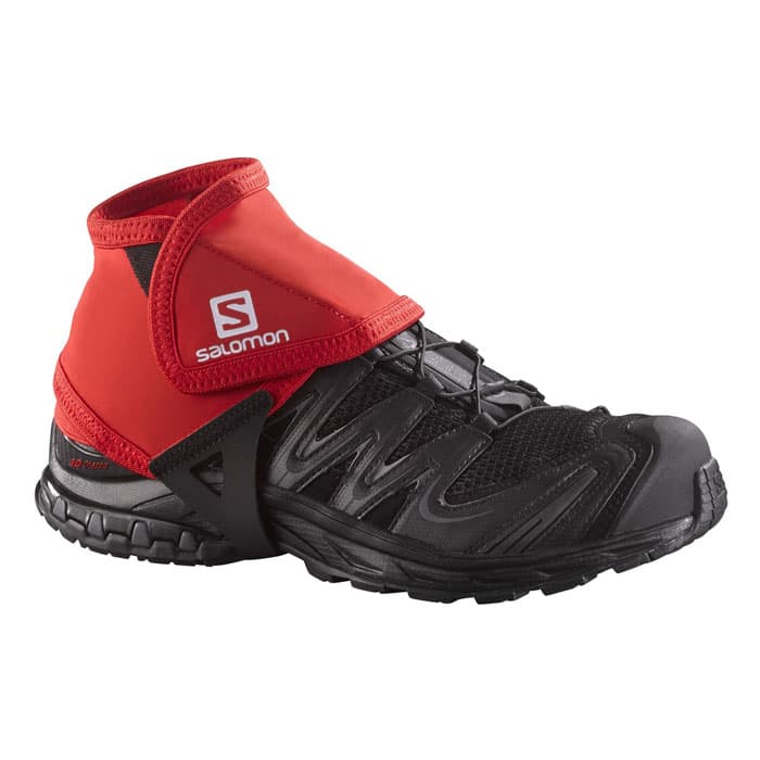 Salomon Trail Gaiters Low in red protecting black running shoes on white background