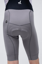 Rear view of Gobik Absolute 7.0 bib shorts in gray with padded chamois