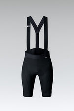 GOBIK black women's cycling bibshort with suspender straps on gray background