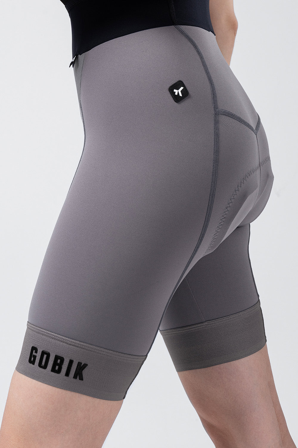 GOBIK Bibshort Absolute Compact 7.0 Women in gray kettle color with professional studio lighting