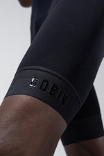 Gobik Absolute 7.0 black bib shorts leg gripper band close-up detail shot