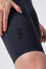 GOBIK women's cycling bib shorts in dark blue with embossed logo