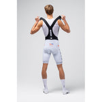 Gobik men's cycling bib shorts in white Ineos Grenadiers team colors, rear view