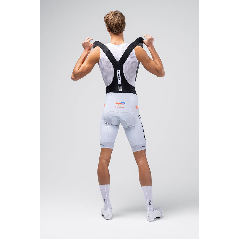 Gobik men's cycling bib shorts in white Ineos Grenadiers team colors, rear view