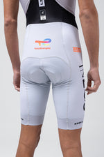 Gobik cycling bib shorts in white Ineos Grenadiers colorway with TotalEnergies sponsor logo