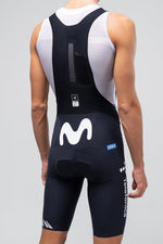 Gobik Ultralite bib shorts in Movistar team colors, rear view showing navy with white M logo