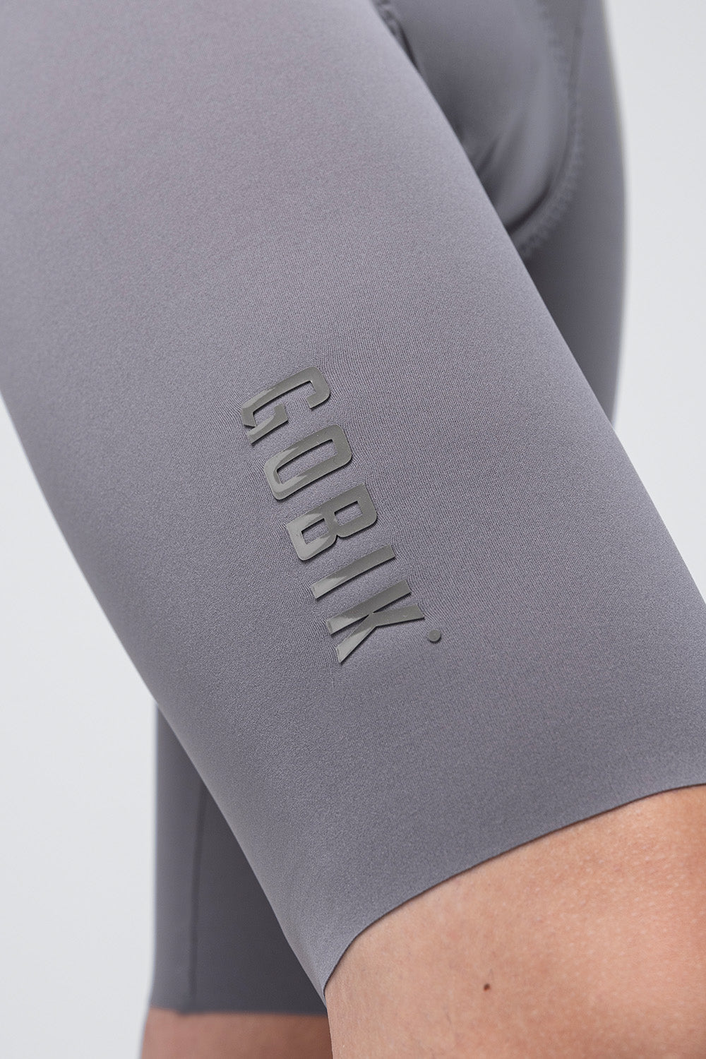 Gobik X Bib Short Men's in grey showing embossed logo detail
