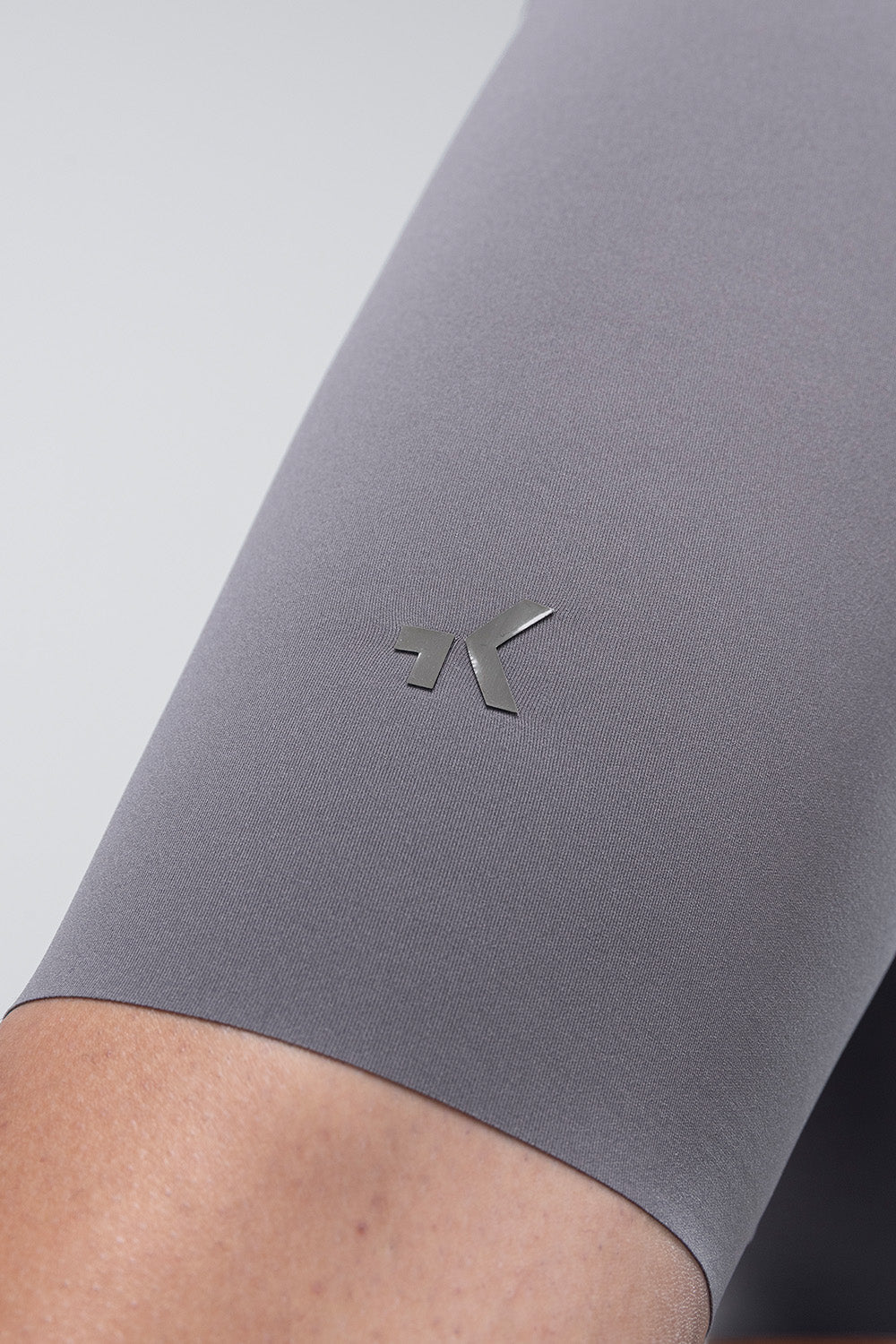 Gobik X men's bib shorts in kettle gray color showing leg detail with logo
