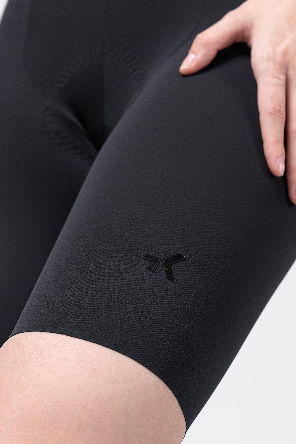 Black Gobik X women's cycling bib shorts detail showing logo and fit