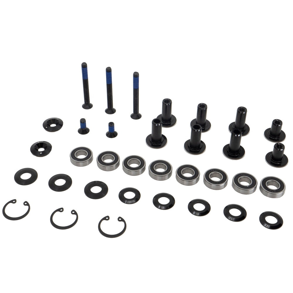 BMC bolt kit with black bolts, washers, bearings and clips on white background