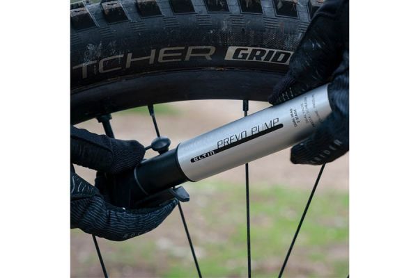 Silver Eltin Prevo bike pump mounted on bicycle wheel with spokes visible