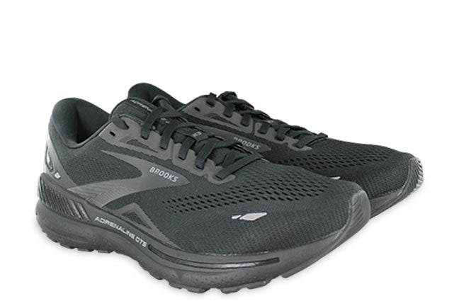 Brooks Adrenaline GTS 23 women's running shoes in black colorway with clean studio lighting