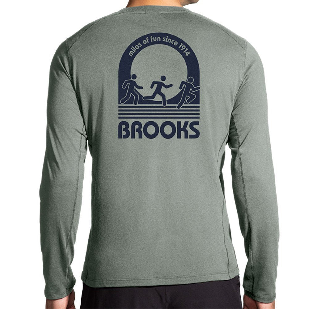 Brooks Distance Long Sleeve shirt in pebble green with retro running graphic on back