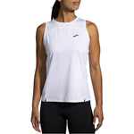 Brooks Sprint Free Tank 2.0 in white, worn by female model on clean background