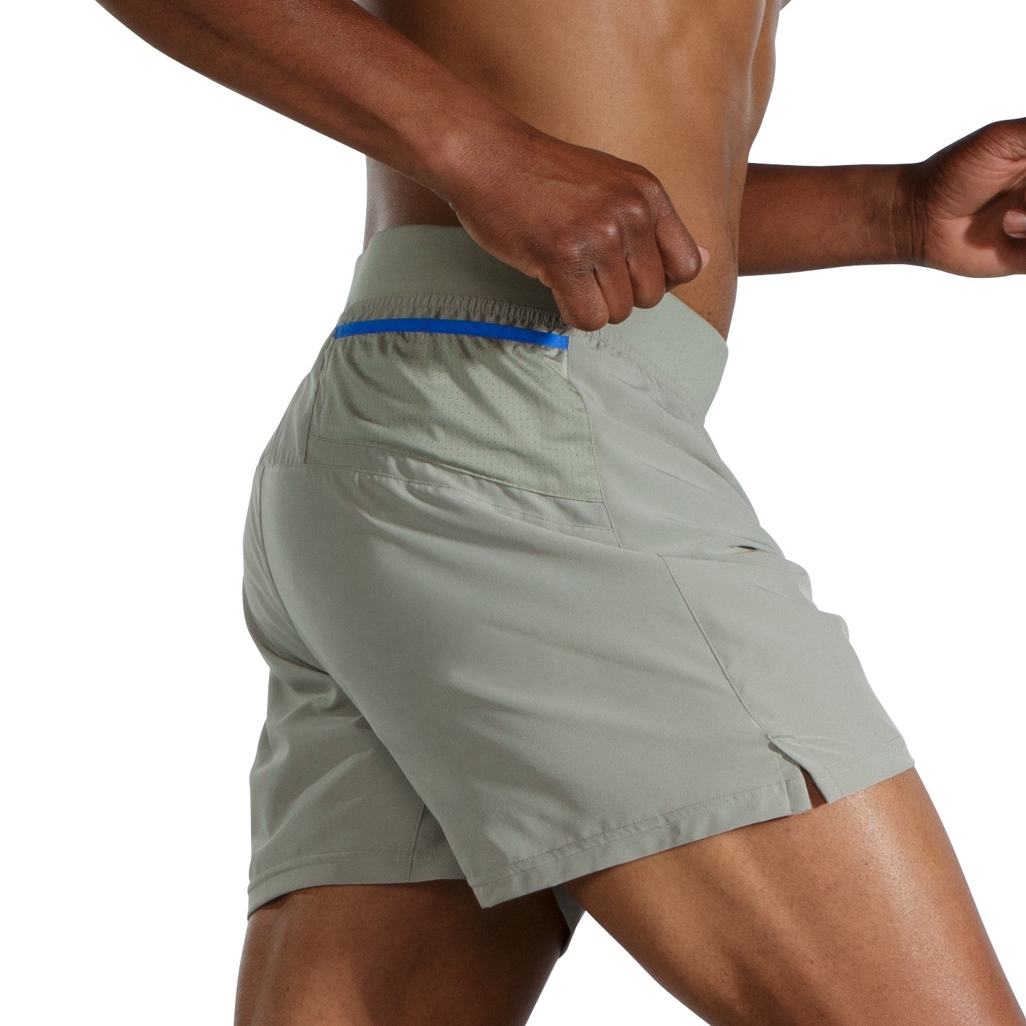 Man wearing Brooks Sherpa 5-inch running shorts in dark oyster green color