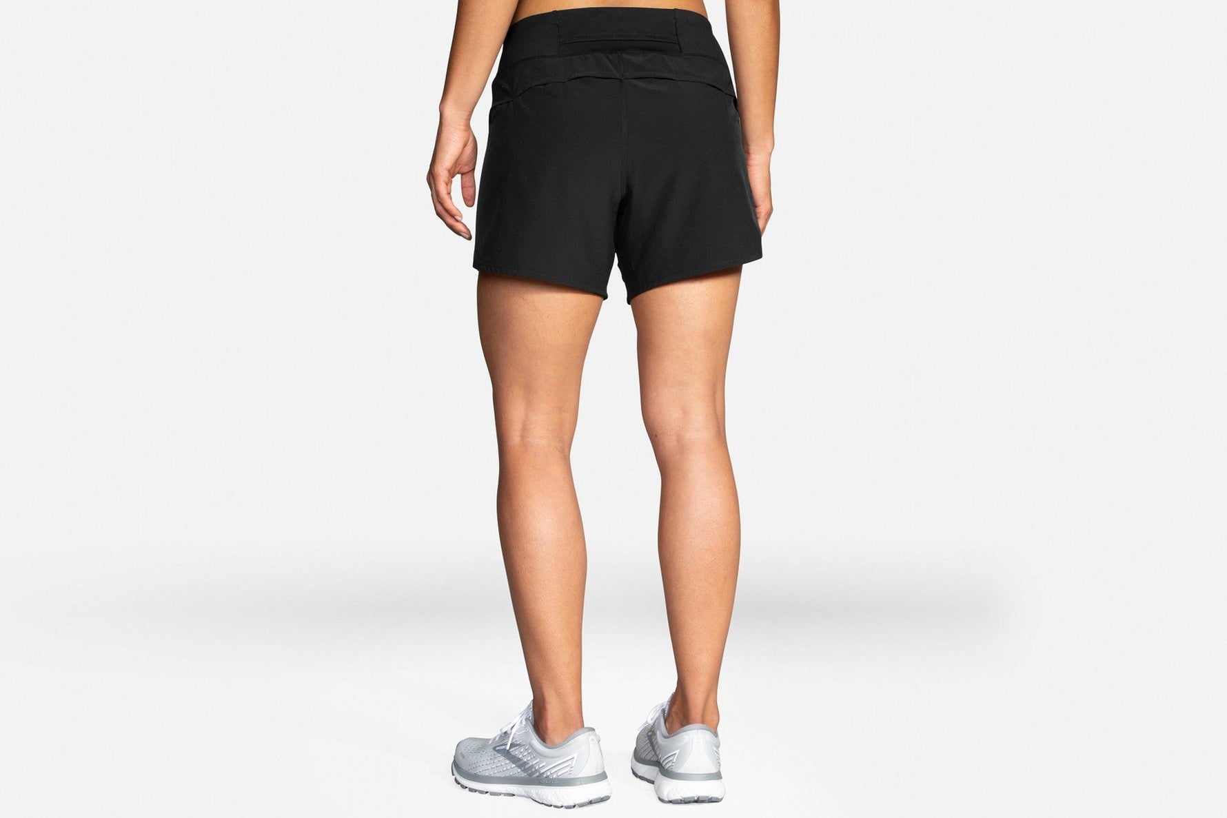 Brooks Chaser 5 inch women's running shorts in black, back view